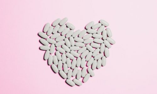 blue-medicine-pills-on-heart-shape-3683046