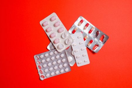 medicine-blister-pack-on-red-surface-3683080 (1)